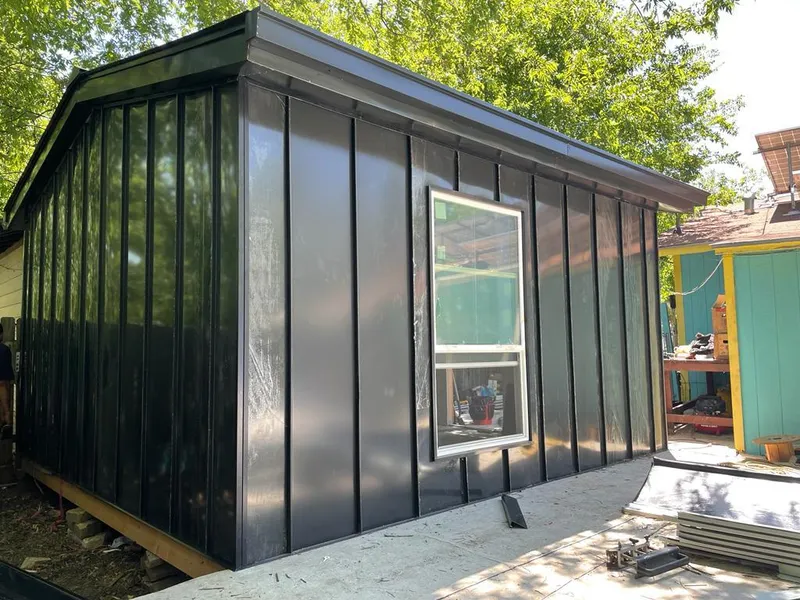 Black standing seam metal wall panels for Metal Roof Installation in Rostraver